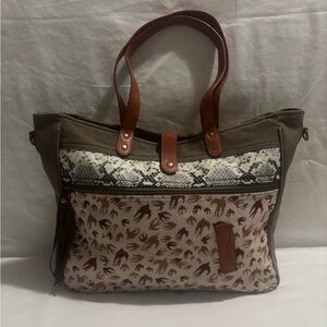 Stylish spacious woman’s Myra Bag with bird and snake print